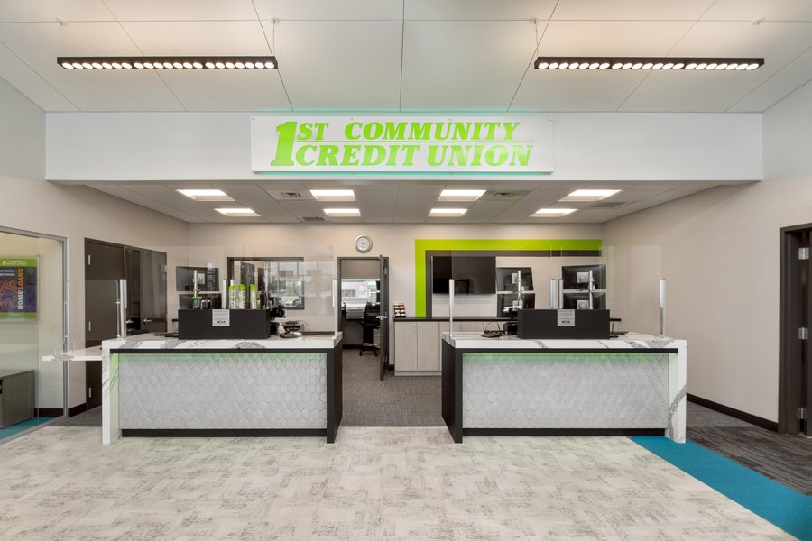 Credit union full teller line with custom casework and branded environment by Robertson Cabinets