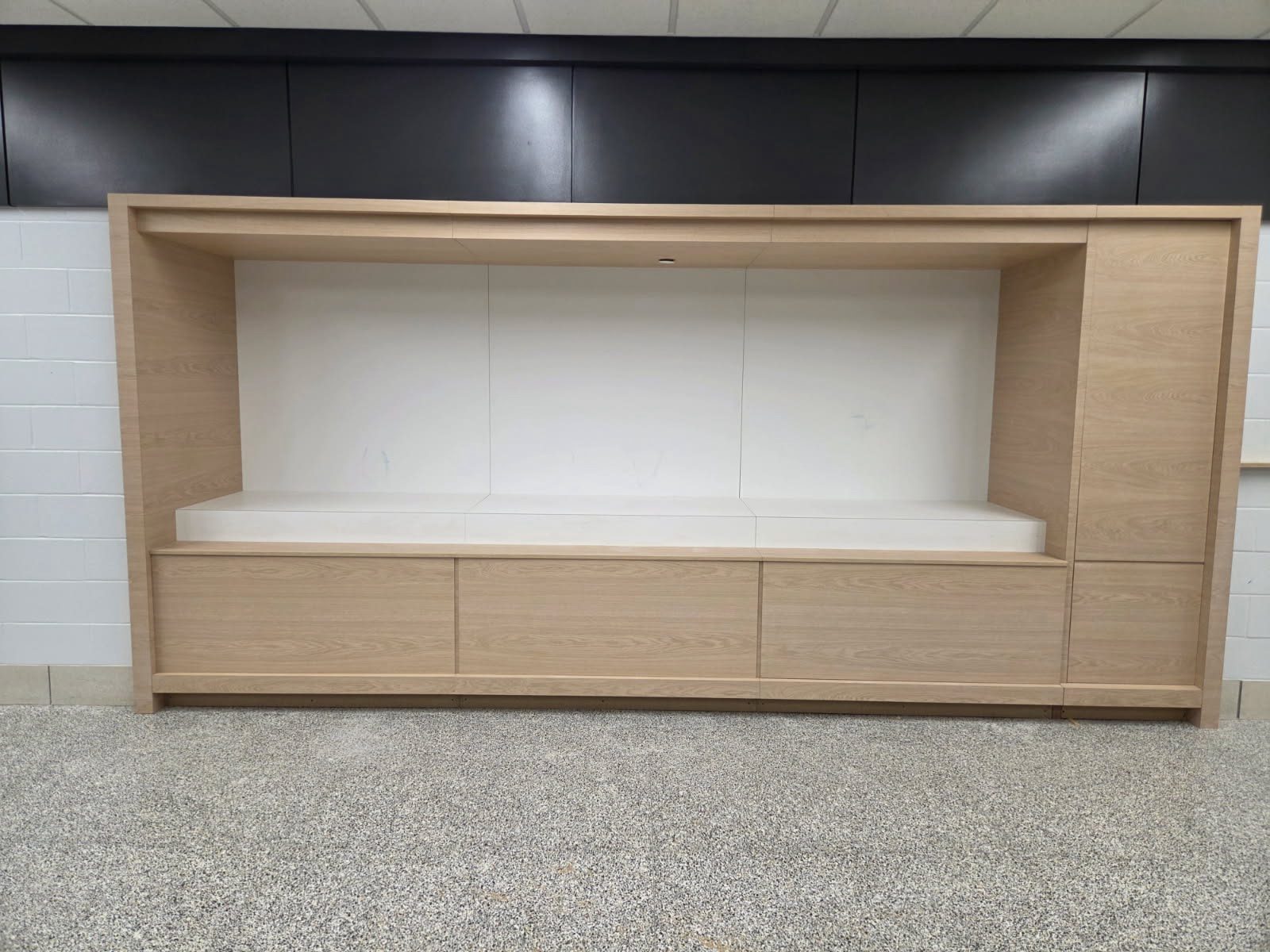 Woodgrain laminate display niche and storage at Lakeland High School, Indiana