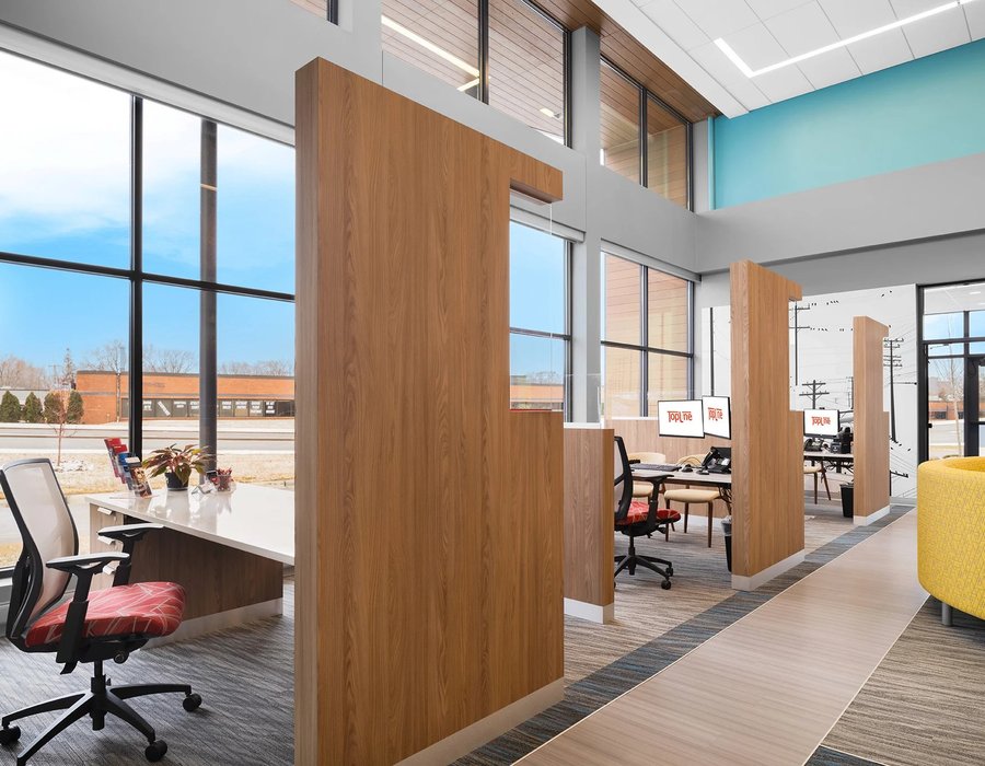 Corporate office casework walnut and gray stone tops by Robertson Cabinets Ohio