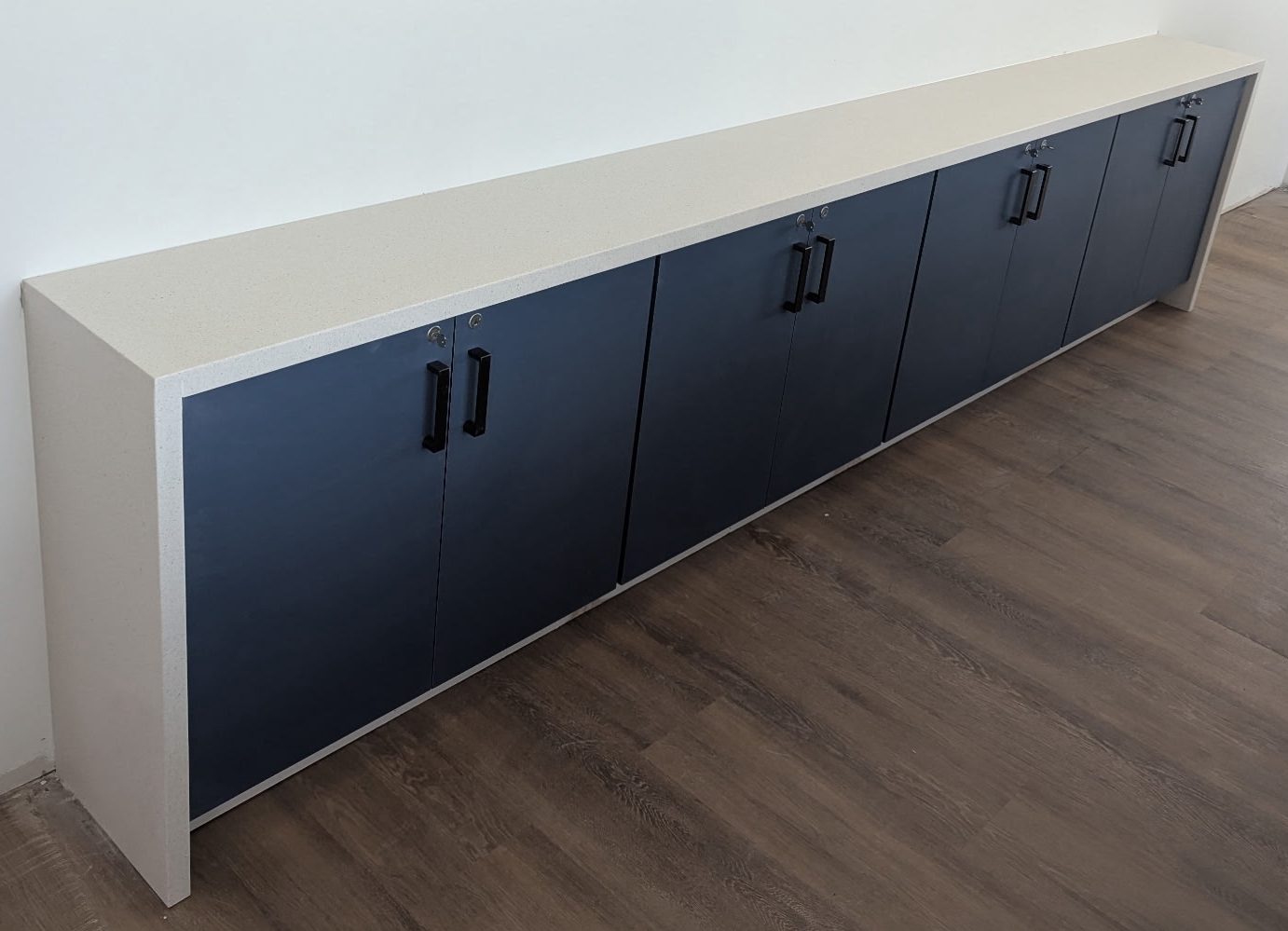 Navy laminate storage casework at Ohio Valley Credit Union, Marietta Ohio, with LEVEL5